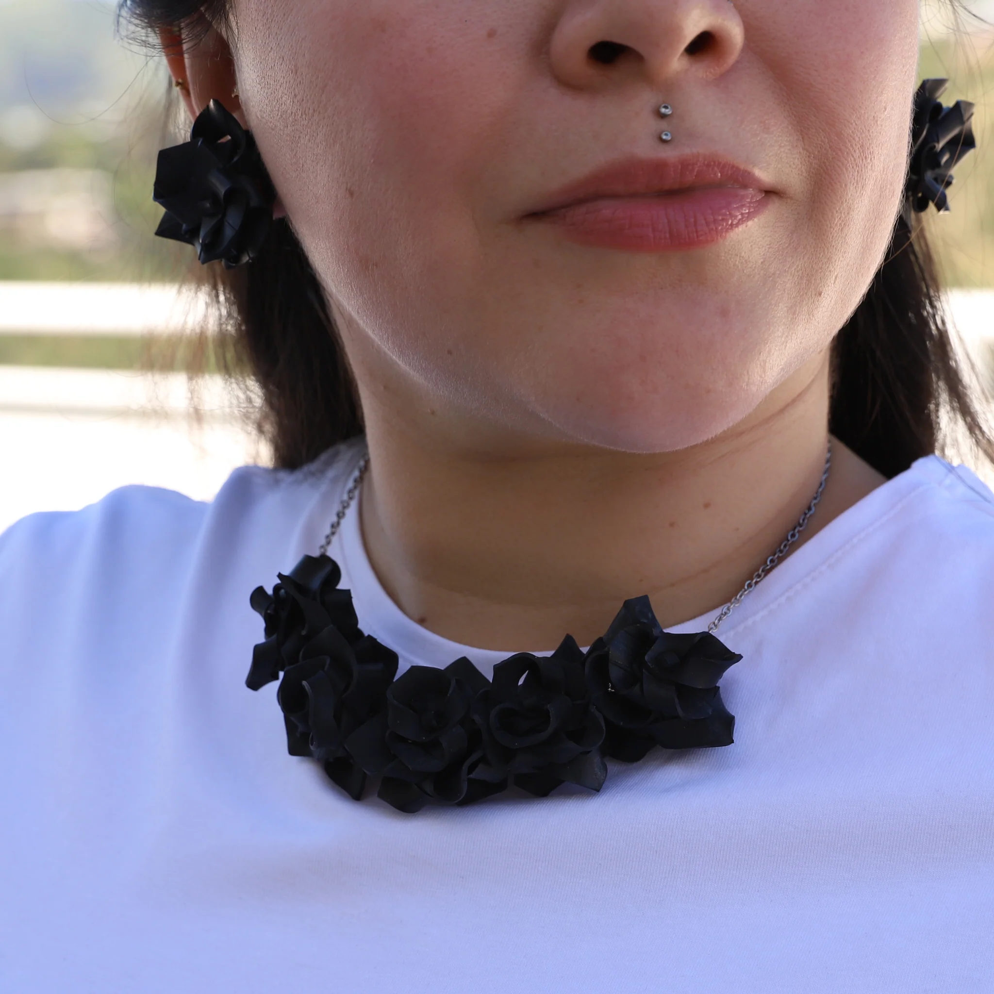Five Rose Upcycled Rubber Necklace - Image 3